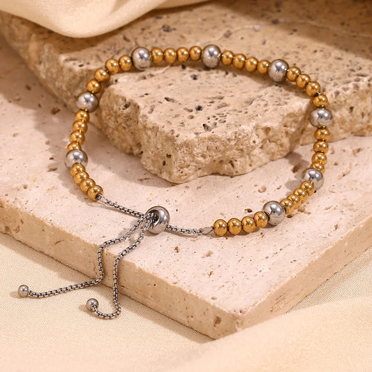 Goldene Damenarmbänder